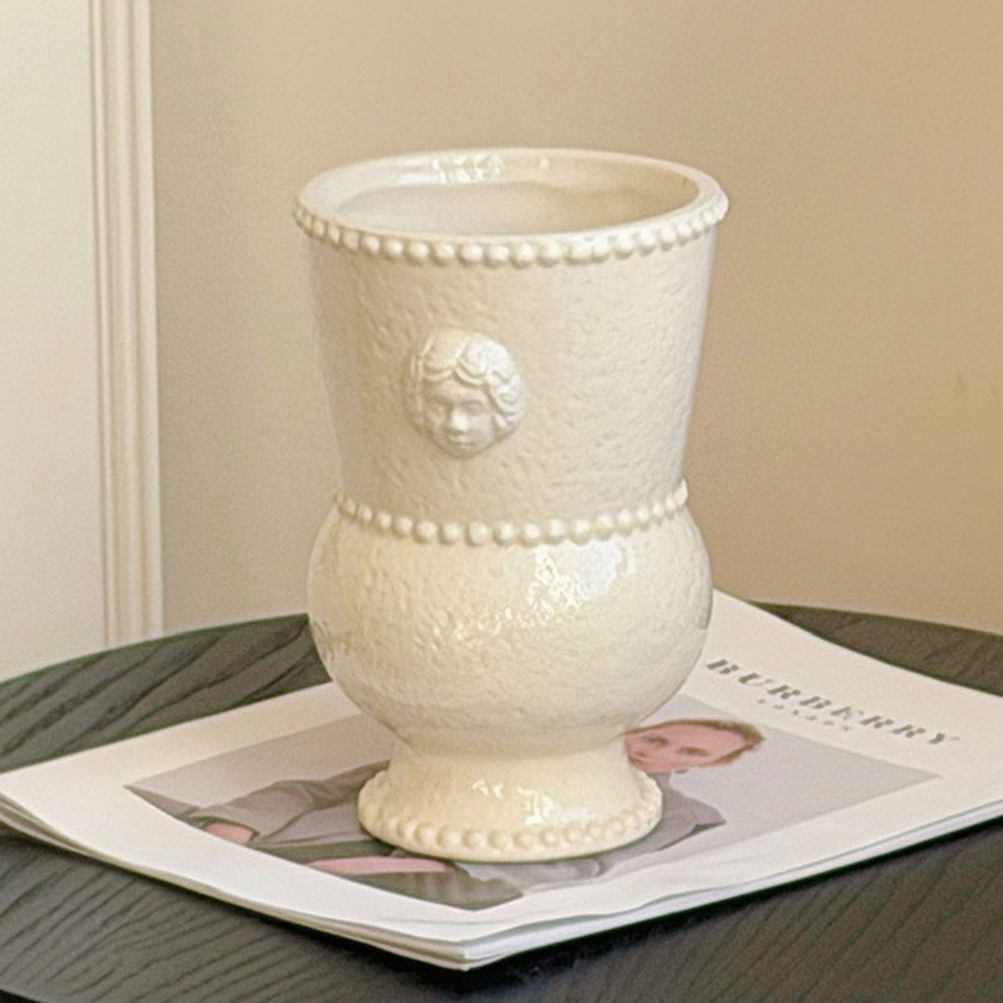 Embossed ceramic urn vase product view