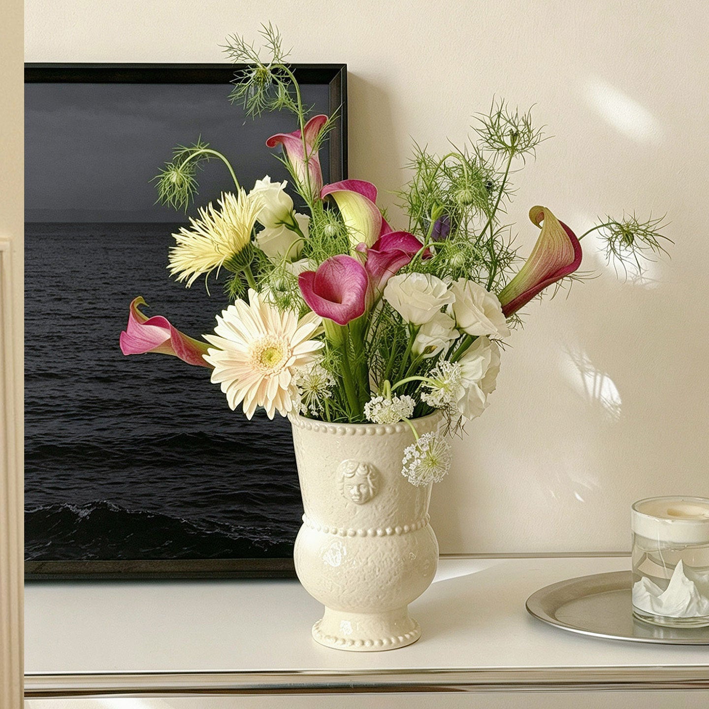 Embossed ceramic vase displayed in a home interior