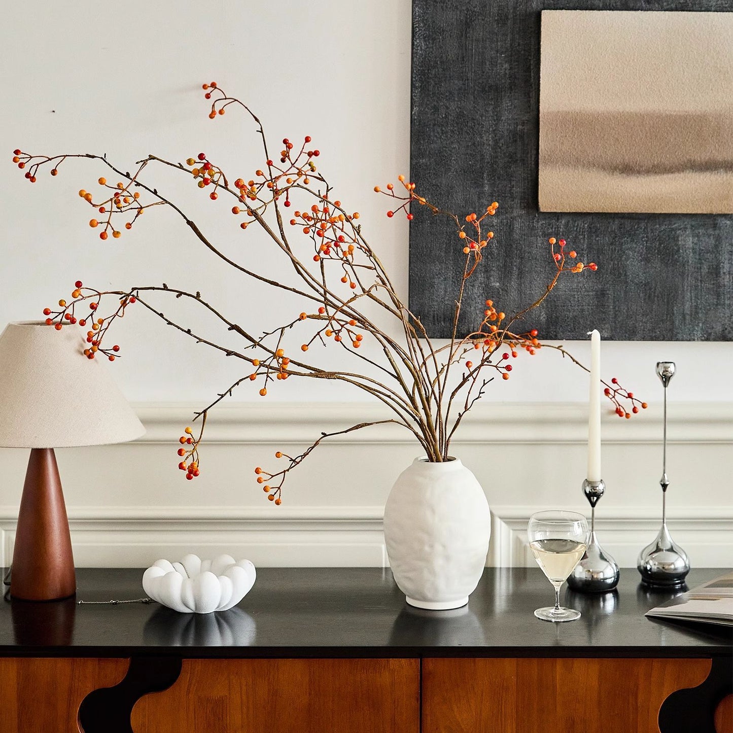 Ridged oval ceramic vase displayed on a console table