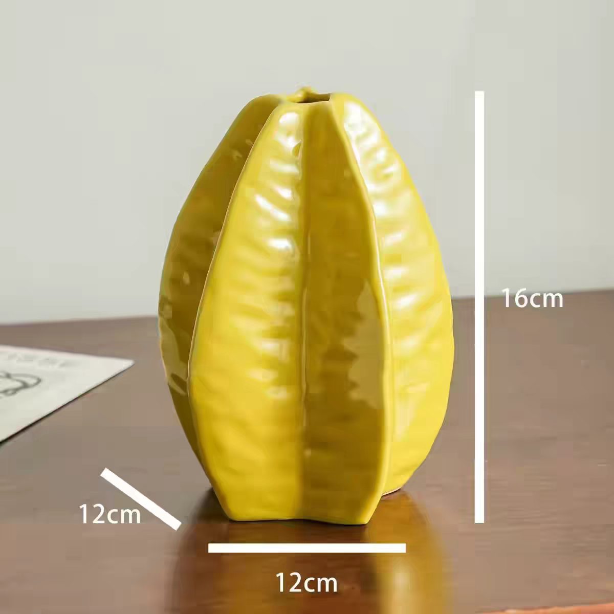 Star fruit shaped ceramic vase dimensions showing height length and width