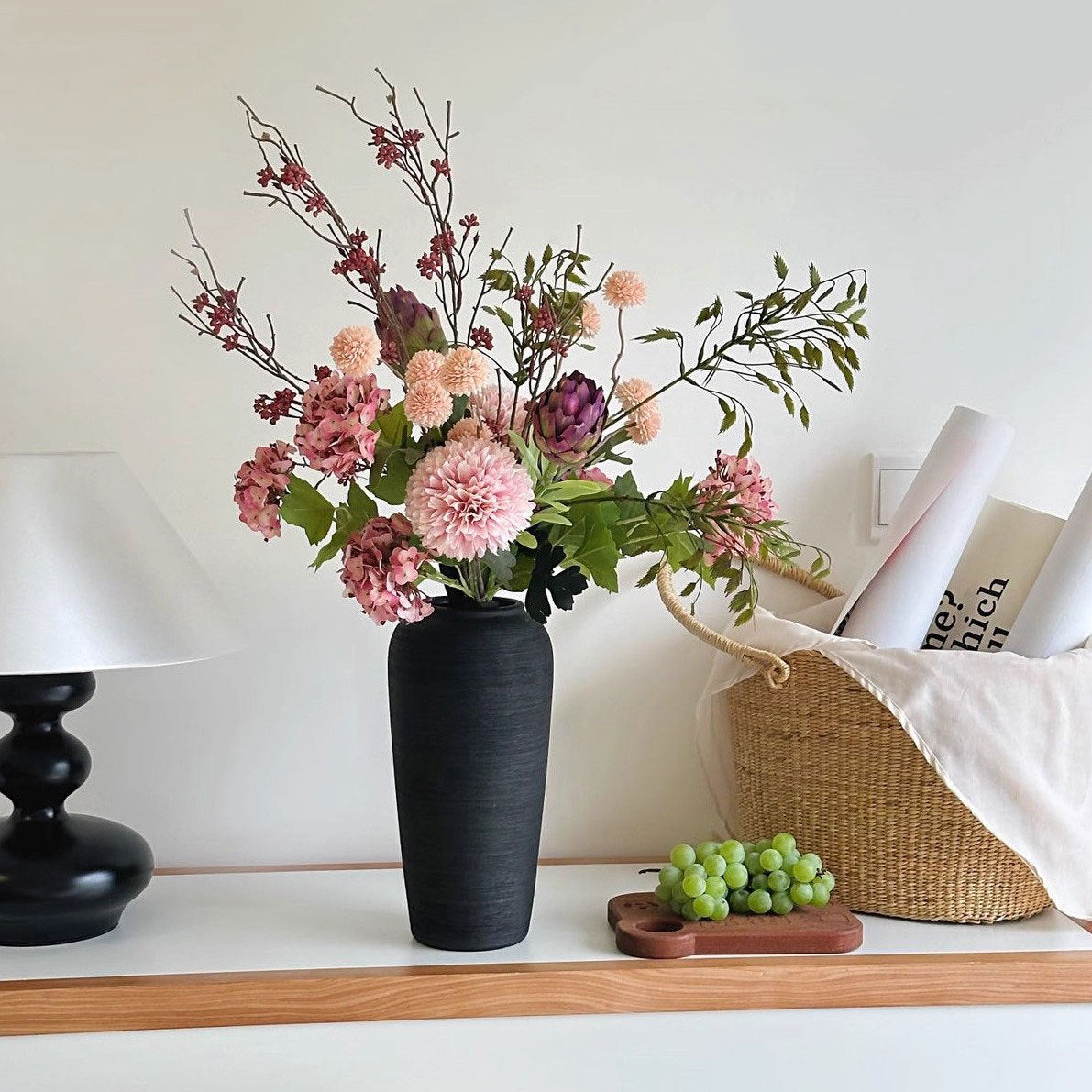 Textured ceramic vase displayed on a shelf